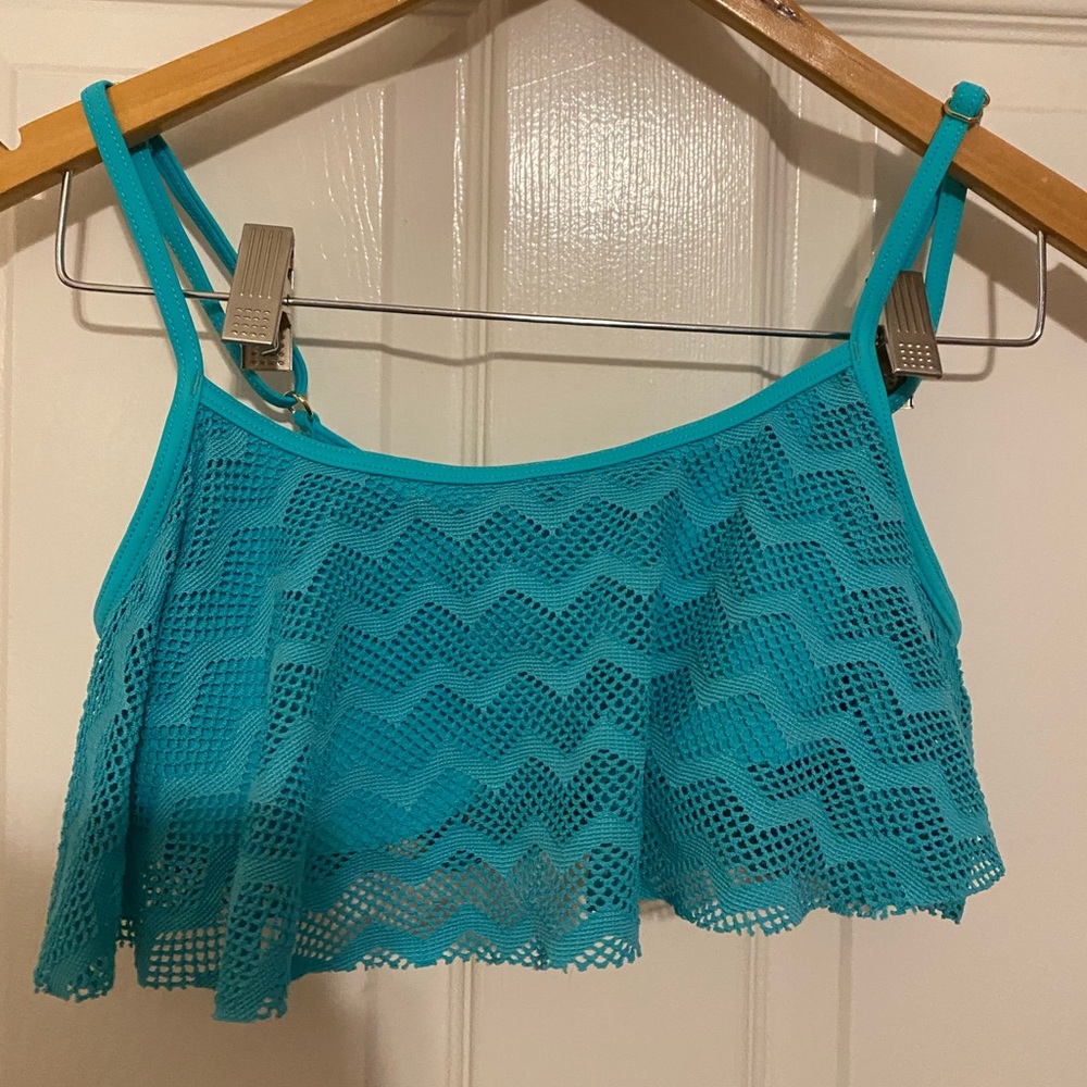 ROXY Teal color swim top. Size medium.